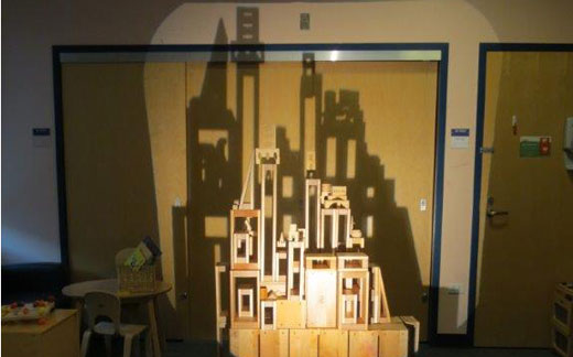 Wooden castle casting shadow