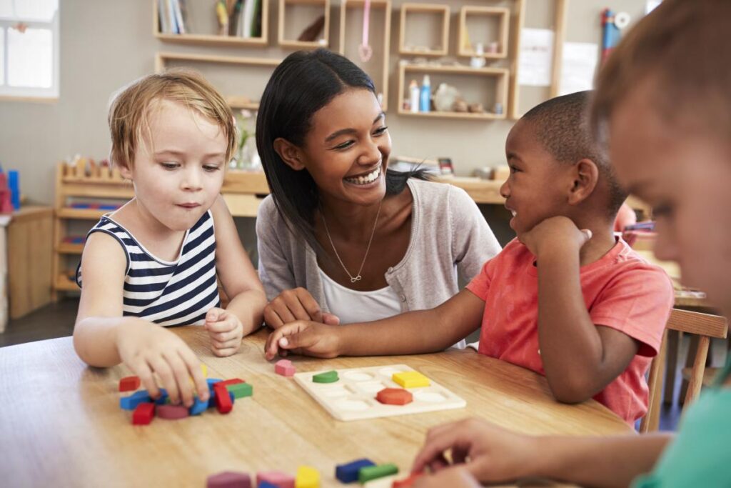 Lady playing with children